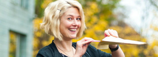 young woman sending mail
