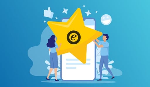 2 people carrying a giant trusted shops star