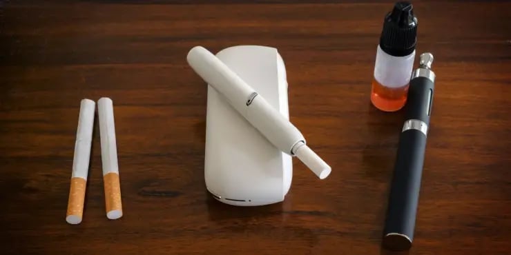 normal cigarettes next to e-cigarettes