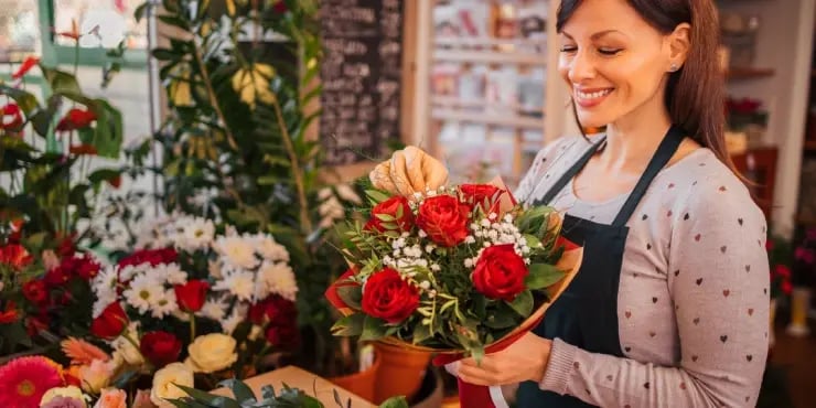 a florist preparing roses