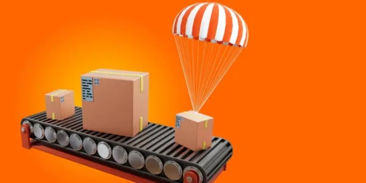 Conveyor belt with a box falling on it from a parachute