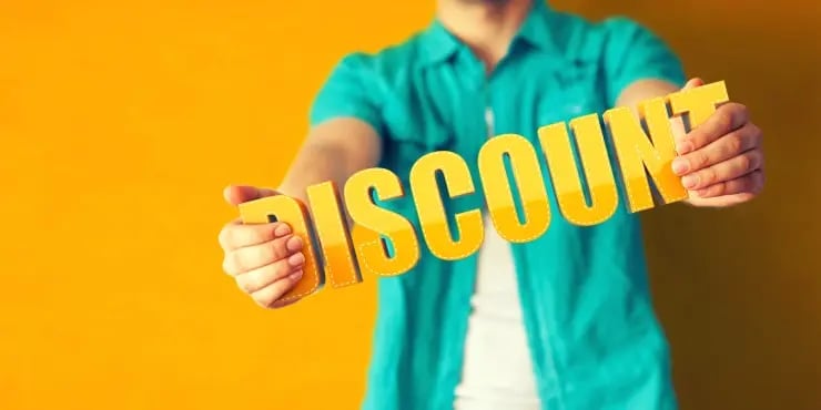 person holding the word discount