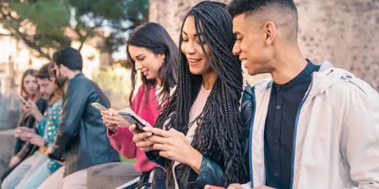 people exchanging contact info