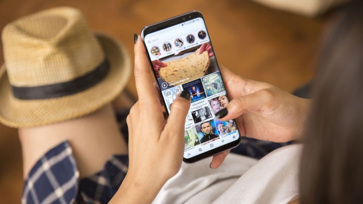 woman looking at instagram