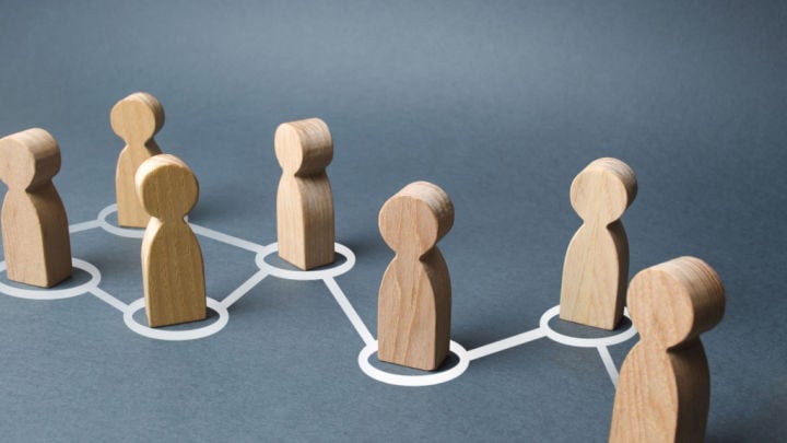wooden figurines connected