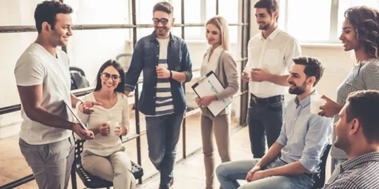 group of people having a stand-up meeting