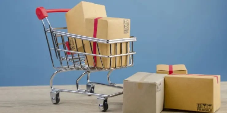 shopping cart filled with packages