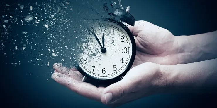 a clock disintegrating in the air