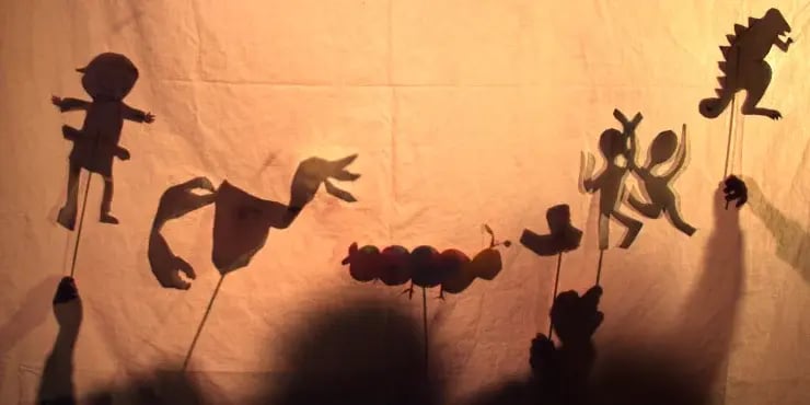 shadow puppets telling a story