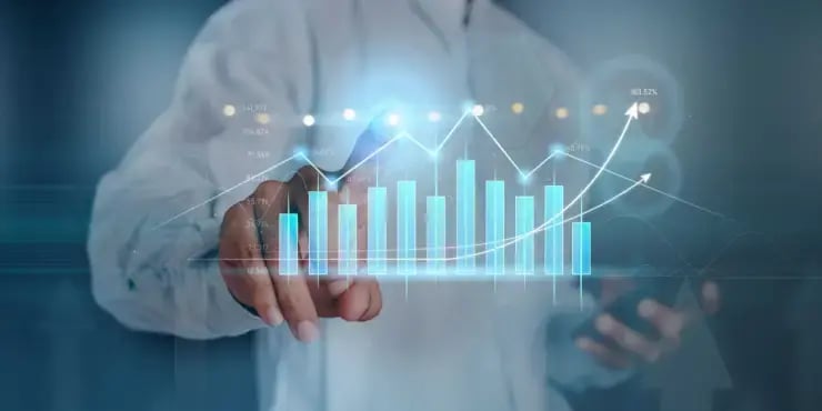 man pointing at 3D chart