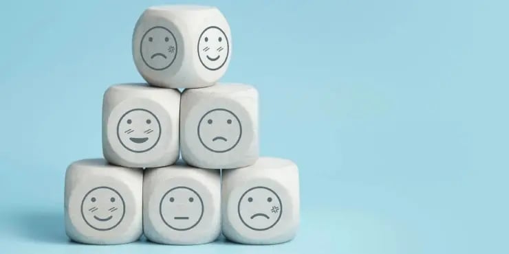 stacked up blocks with variation of emotions displayed