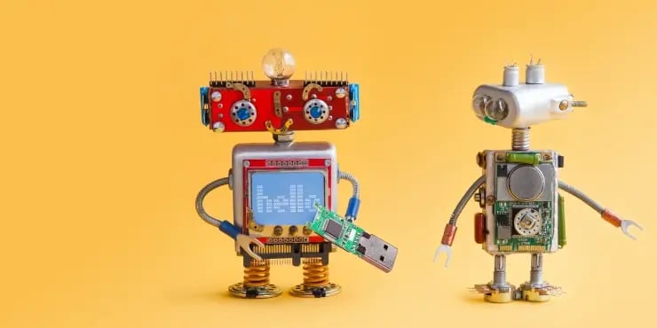 Two robots standing around