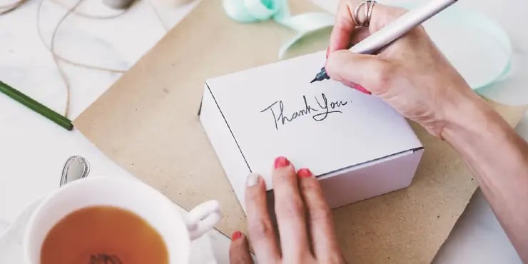 thank you note being written