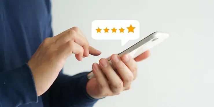 smartphone showing a 5-star rating